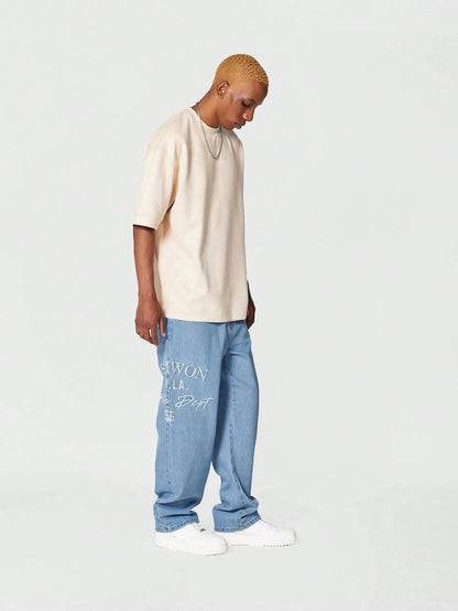 Calça Denim reta com bordado